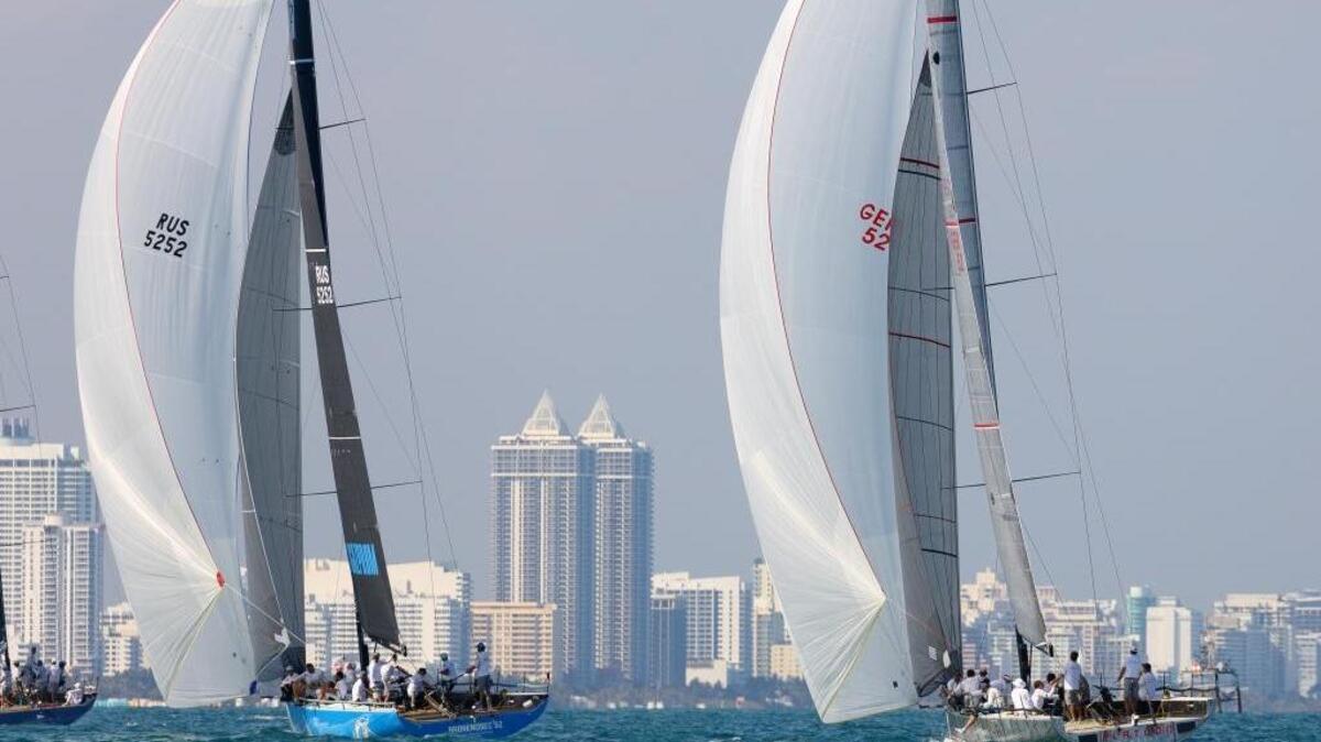 Russia's Bronenansec, left, and Germany's Platoon fly spinnakers in TP 52 Super Series Miami Royal Cup regatta.