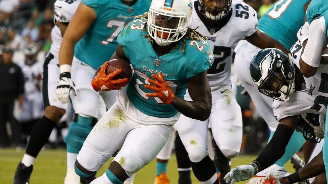 Miami Dolphins running back Jay Ajayi scores on a 2-yard first-quarter touchdown run against the Philadelphia Eagles on last Thursday.