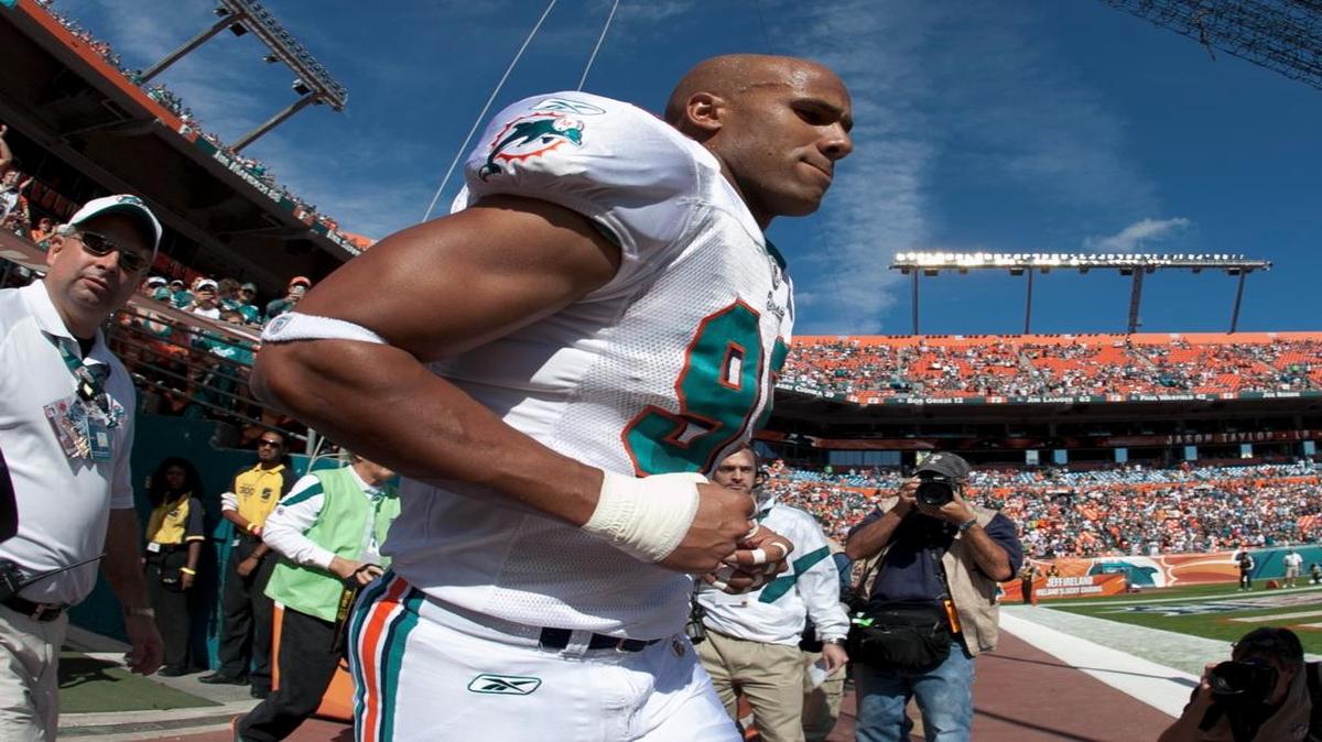 Miami Dolphins linebacker Jason Taylor is introduced before the team’s game against the New York Jets at Sun Life Stadium in Miami Gardens on Jan. 1, 2012.