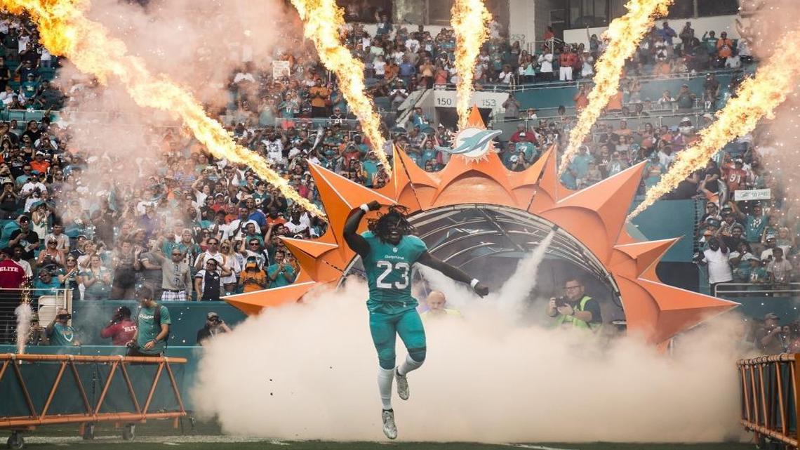 Miami Dolphins running back Jay Ajayi makes his entrance into the game versus the New England Patriots at Hard Rock Stadium in Miami Gardens, Florida, Jan. 1, 2017.