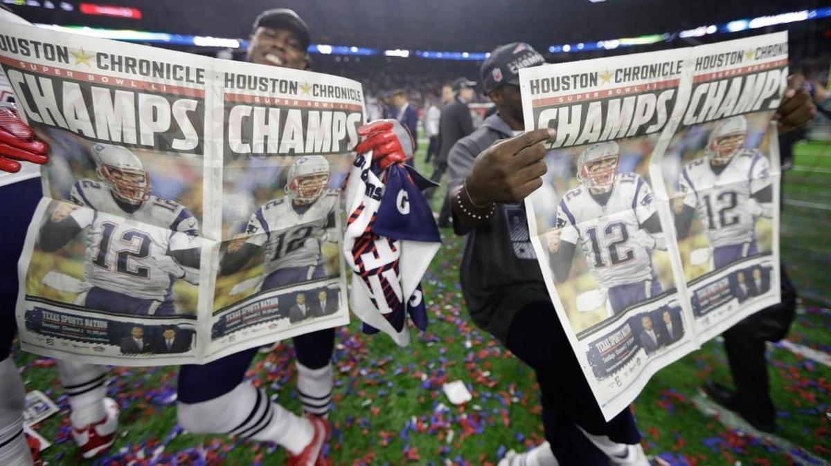 New England Patriots players celebrate after the NFL Super Bowl 51 football game against the Atlanta Falcons Sunday, Feb. 5, 2017, in Houston.