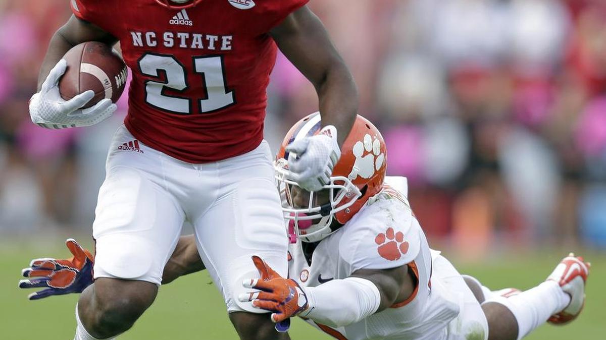 Clemson's Cordrea Tankersley, right. dives for North Carolina State's Matthew Dayes during 2015 game. He was the Dolphins third-round selection Friday.