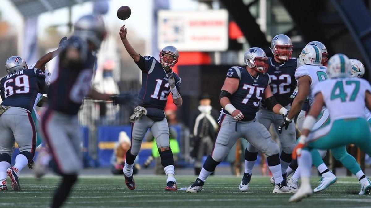 New England Patriots quarterback Tom Brady passes against the Miami Dolphins during the first half of an NFL football game, Sun., Nov. 26, 2017, in Foxborough, Mass.