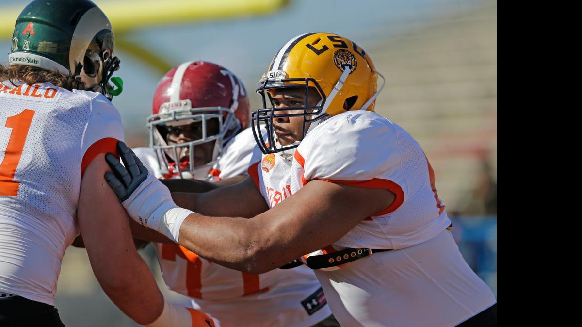 
LSU offensive tackle La’El Collins (60) runs through drills during practice for the Senior Bowl, Wednesday, Jan. 21, 2015, at Ladd-Peebles Stadium in Mobile, Ala. 
