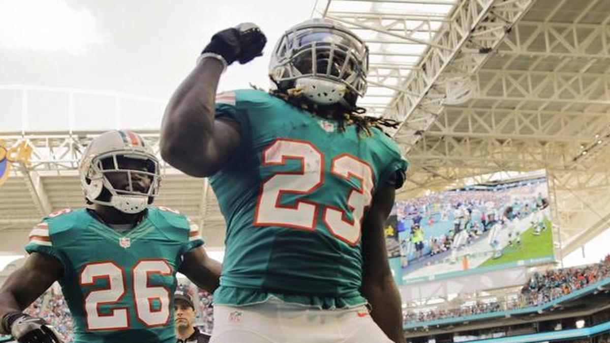 Miami Dolphins running back Jay Ajayi celebrates after scoring in the second quarter against San Francisco last season.