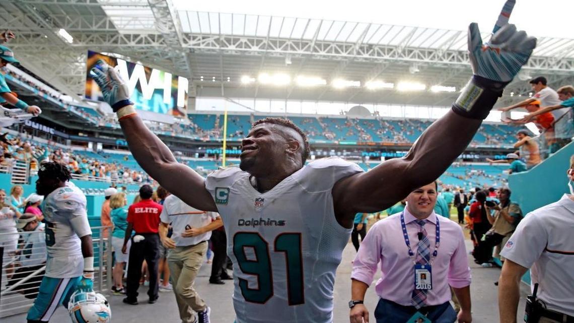 Defensive end Cameron Wake smiles after the Dolphins’ victory over the Steelers at Hard Rock Stadium on Oct. 16.