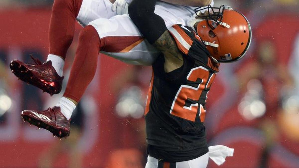 Tampa Bay Buccaneers wide receiver Adam Humphries is tackled by Cleveland Browns cornerback Joe Haden after a reception during last week’s preseason game.