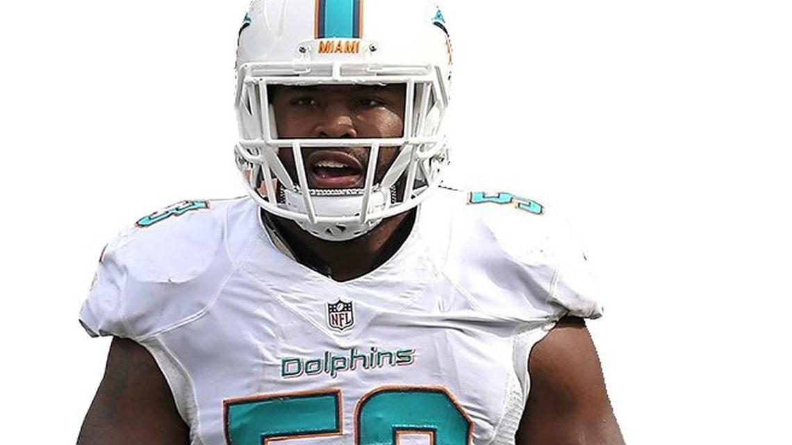 Miami Dolphins linebacker Jelani Jenkins awaits the snap against the Chicago Bears at Soldier Field on October 19, 2014 in Chicago, Illinois.