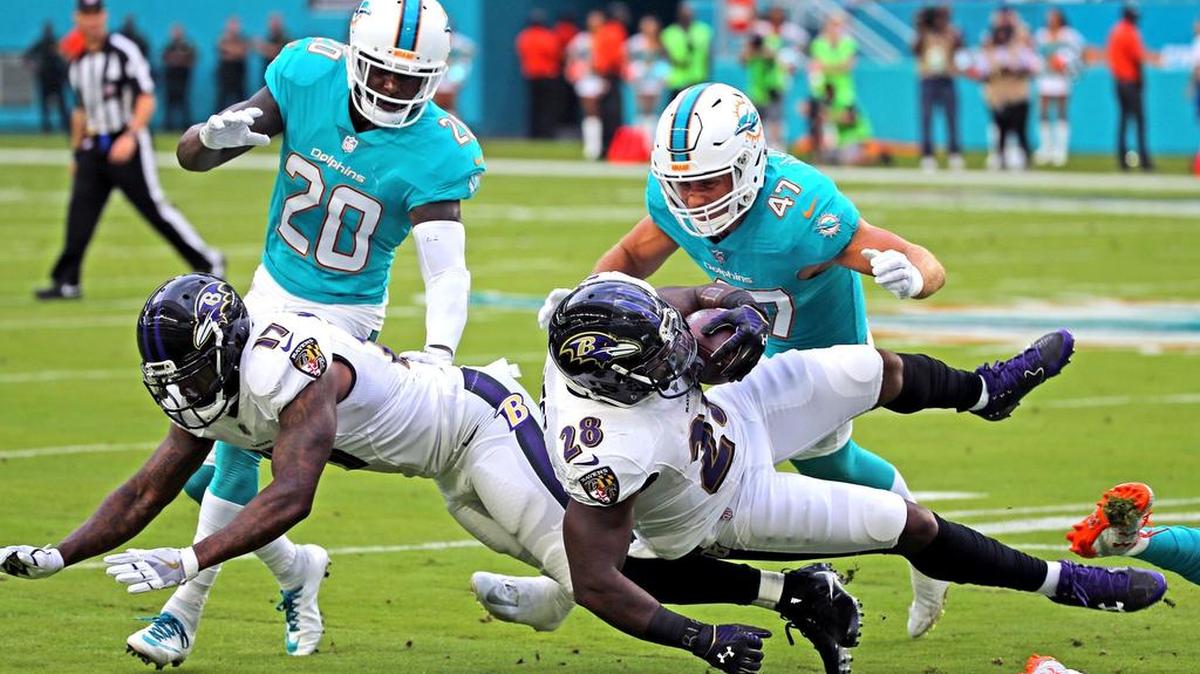 Dolphins Reshad Jones (20) -- here playing in the preseason game against Baltimore -- will be one of two University of Georgia safeties on the Dolphins to start the regular season.