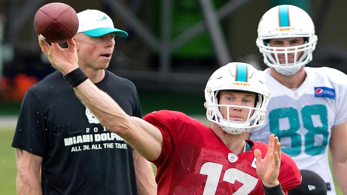 
Miami Dolphins quarterback Ryan Tannehill (17) passes during NFL training camp, Saturday, Aug. 1, 2015 at Nova Southeastern University in Davie, Fla. 
