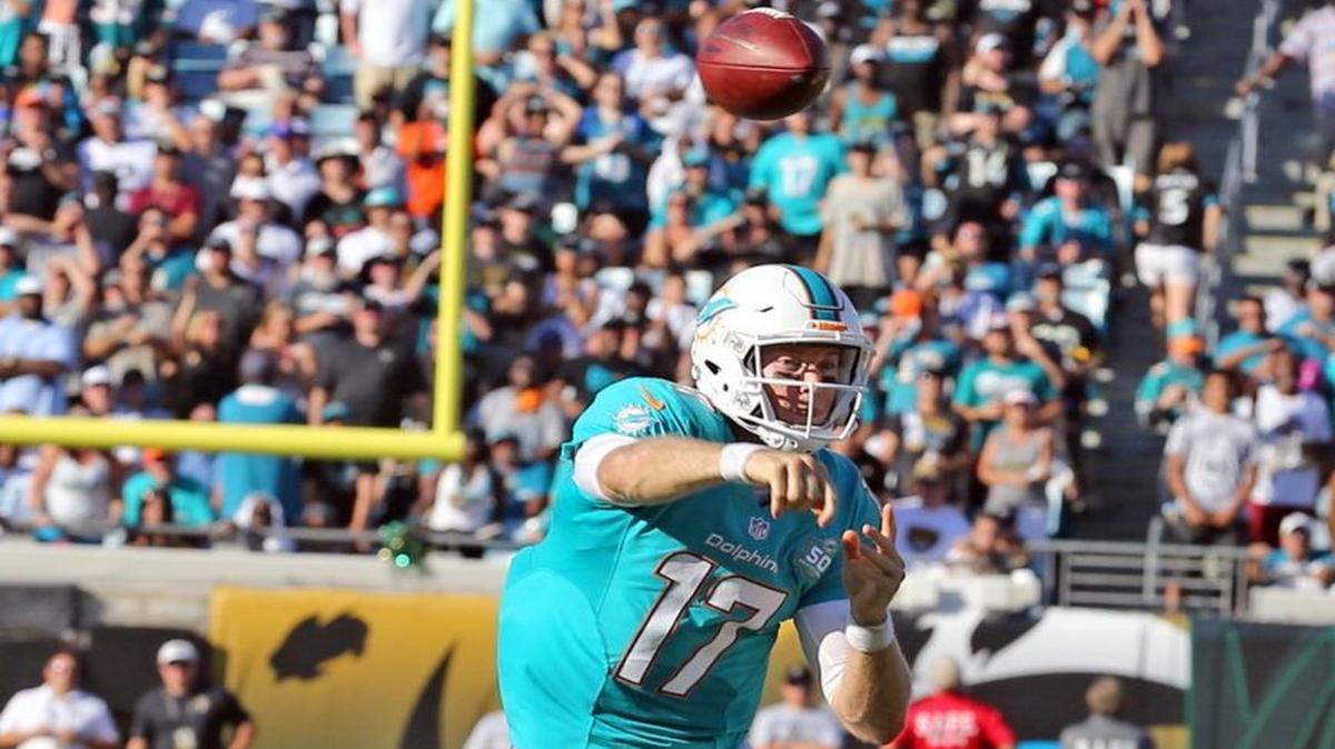 Miami Dolphins quarterback Ryan Tannehill throws a second quarter touchdown to Damien Williams as they play the Jacksonville Jaguars at EverBank Field in Jacksonville, Florida, September 20, 2015.