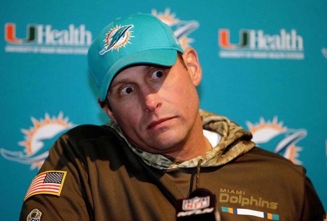 Miami Dolphins head coach Adam Gase speaks to the media following an NFL football game against the New England Patriots, Sun., Nov. 26, 2017, in Foxborough, Mass.