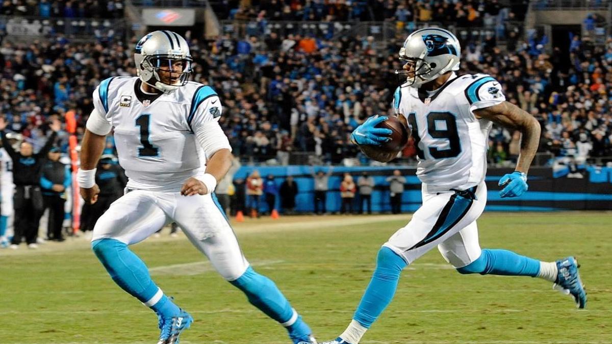 Carolina Panthers' Ted Ginn runs for a touchdown as teammate Cam Newton runs with him during the first half of the NFC Championship game against the Arizona Cardinals, Sunday, Jan. 24, 2016, in Charlotte, N.C.