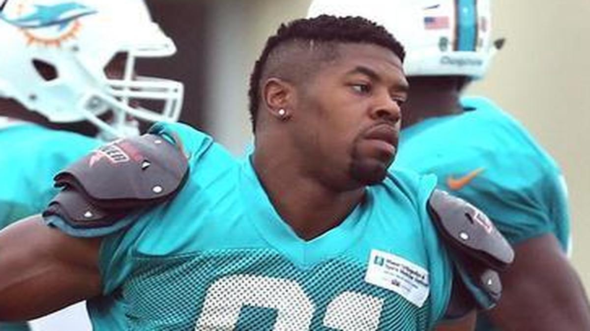 Miami Dolphins Cameron Wake gets ready for defensive drills during training camp at the Miami Dolphins training facility on Monday.
