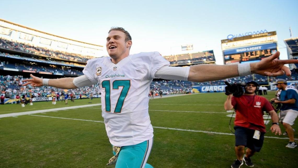 Miami Dolphins quarterback Ryan Tannehill celebrates as his leaves the field after their win against the San Diego Chargers during an NFL football game in San Diego on Nov. 13, 2016.