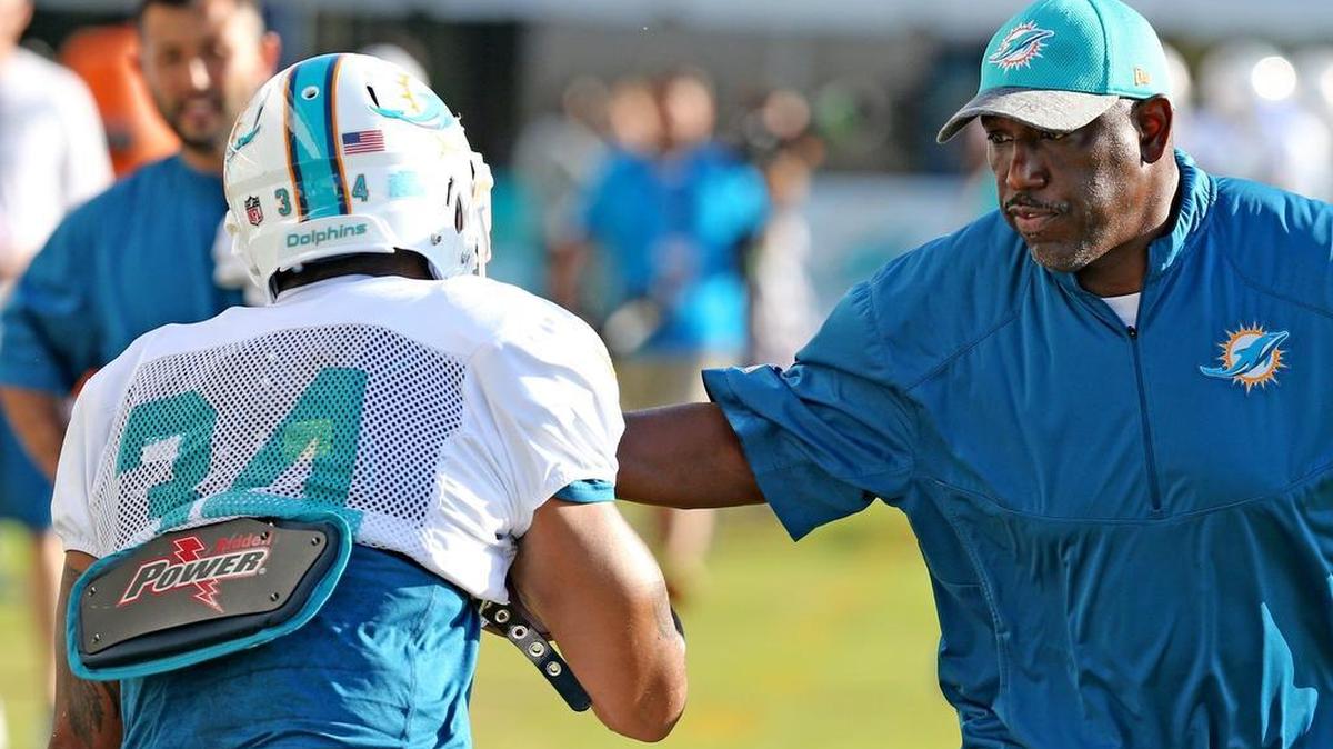 Dolphins running back coach Danny Barrett has been let go by the team.