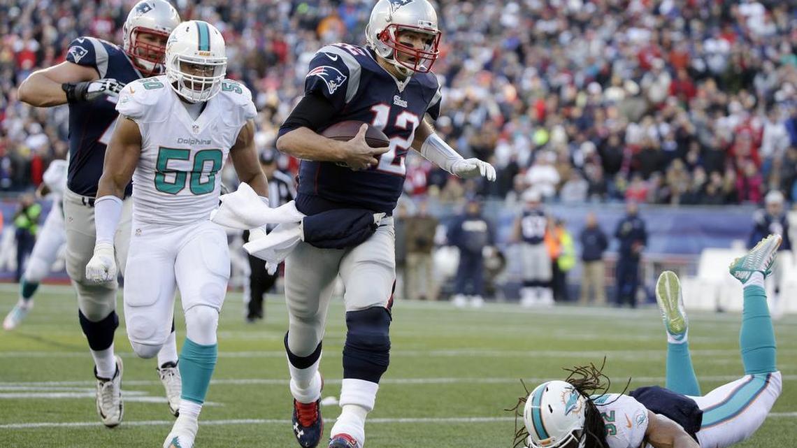 New England Patriots quarterback Tom Brady -- here against the Dolphins in 2014 -- actually helped the Dolphins on Sunday by leading his New England team to a victory over Denver.