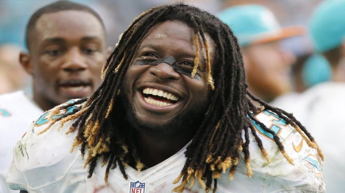 Miami Dolphins running back Jay Ajayi (23) is all smiles after running over 200 yards as the Miami Dolphins defeat the Pittsburgh Steelers at Hard Rock Stadium on Sun., Oct. 16, 2016.