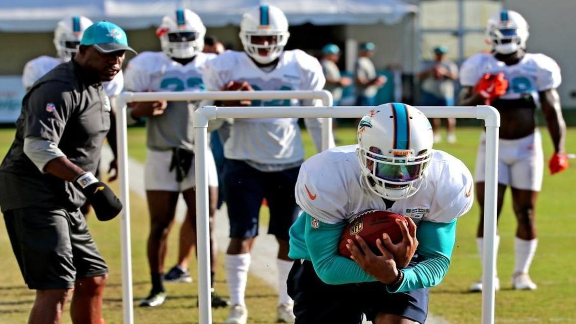 Miami Dolphins RB Kenyan Drake runs a drill at the Miami Dolphins training facility in Davie, FL, August 14, 2017.