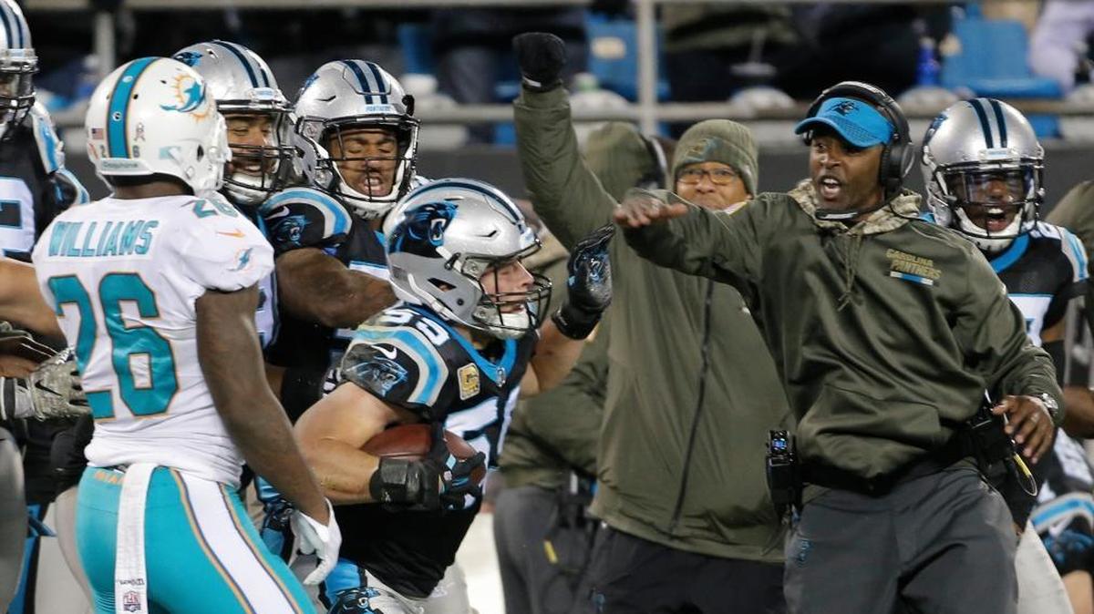 Carolina Panthers' Luke Kuechly (59) celebrates after an interception against the Miami Dolphins in the first half of an NFL football game in Charlotte, N.C., Mon., Nov. 13, 2017.