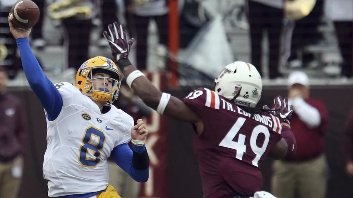 Virginia Tech linebacker Tremaine Edmunds rushes Pittsburgh quarterback Kenny Pickett.