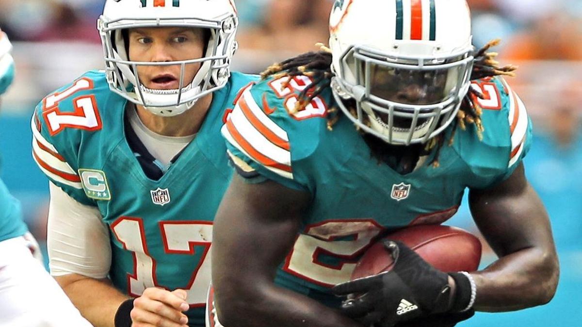 Running back Jay Ajayi (23) is carrying the Dolphins’ offense now, and that big jump Ryan Tannehill (17) was supposed to make under coach Adam Gase has not manifested.