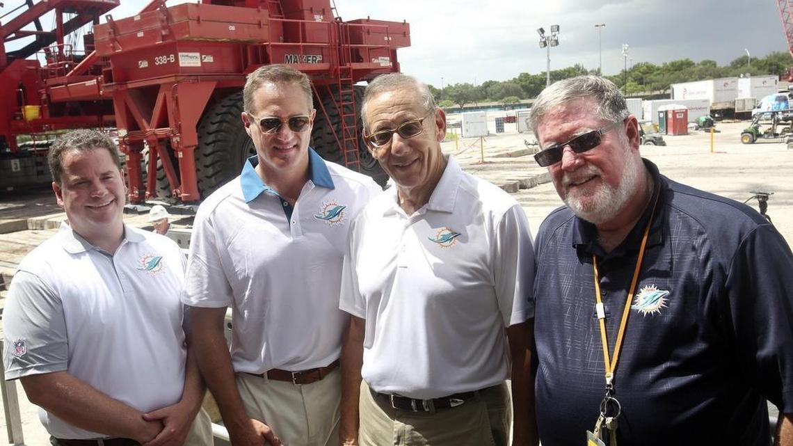 Miami Dolphins owner Stephen Ross (third from the left) oversaw renovations of Hard Rock Stadium and now wants to be part of rebuilding South Florida after Hurricane Irma. Also pictured club vice chairman Matt Higgins, left, president and CEO Tom Garfinkel, and Bill Senn, vice president of stadium renovations.