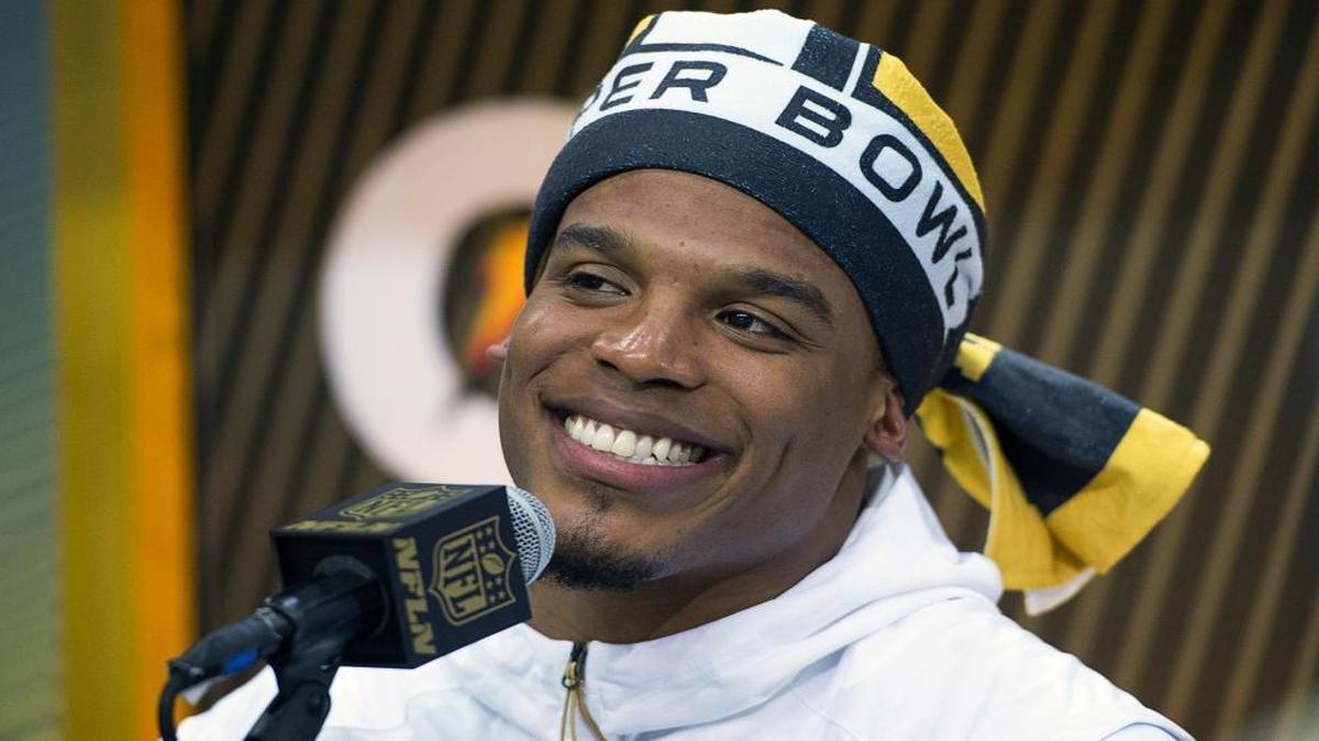 Carolina Panthers quarterback Cam Newton talks to the media during Superbowl 50 media day at the SAP Center Monday, February 1, 2016 in San Jose, Calif.