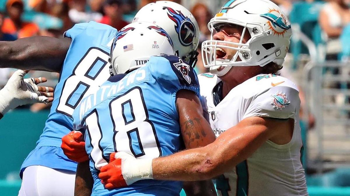 Miami Dolphins Kiko Alonso tackles Tennessee Titans receiver Rishard Mathews on Sunday.
