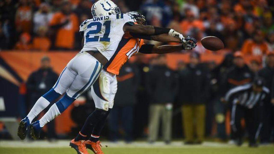 
Colts cornerback Vontae Davis breaks up a pass intended for Broncos wide receiver Emmanuel Sanders on Sunday, Jan. 11, 2015, at Sports Authority Field at Mile High in Denver.
