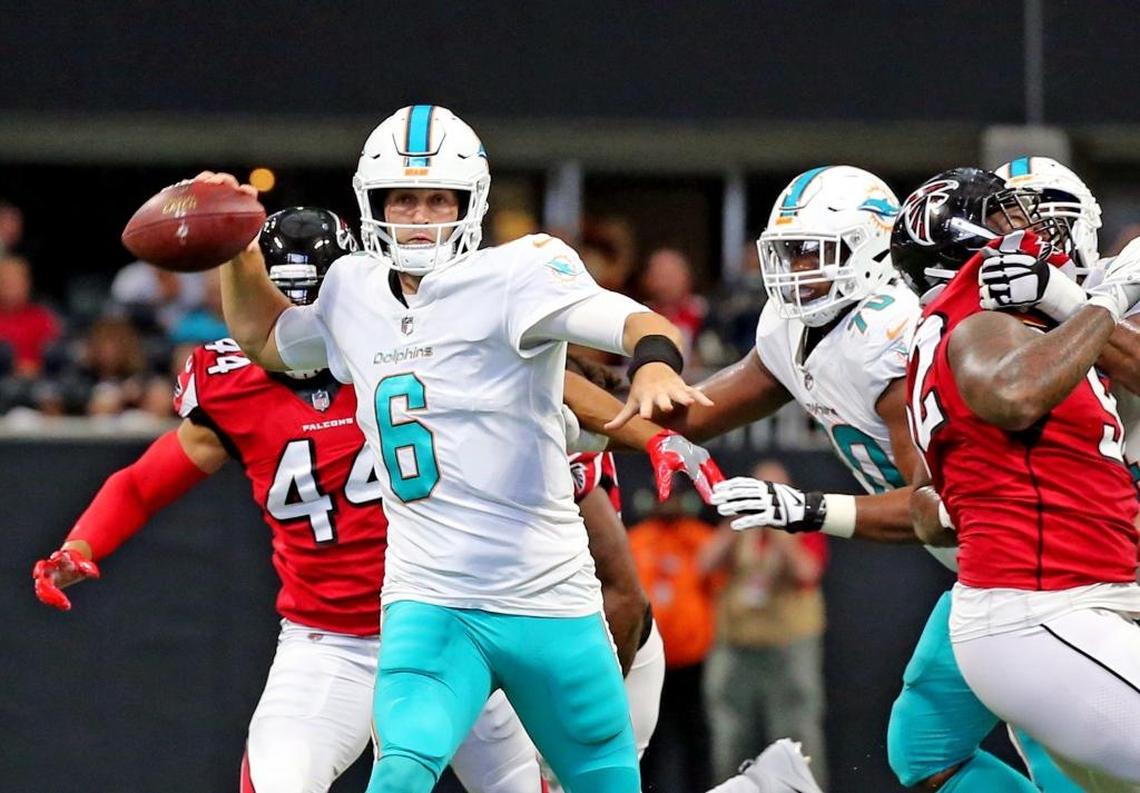 Miami Dolphins quarterback Jay Cutler (6) throws an interception late in the second quarter as they play the Atlanta Falcons at the Mercedes-Benz Stadium in Atlanta, Ga., Oct. 15, 2017.