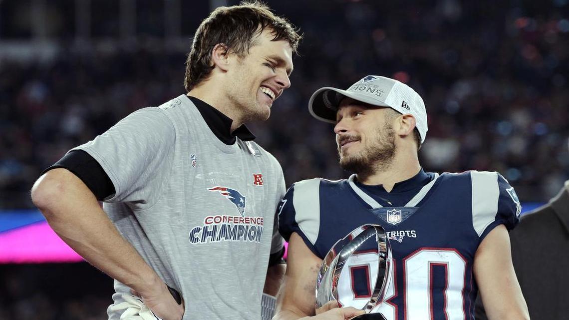 New England Patriots quarterback Tom Brady, left, speaks to wide receiver Danny Amendola after winning the AFC championship game last January.