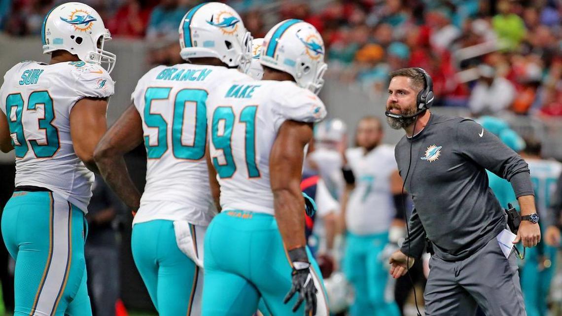 Miami Dolphins defensive coordinator Matt Burke yells at his players as they come off the field as they play the Atlanta Falcons last month.