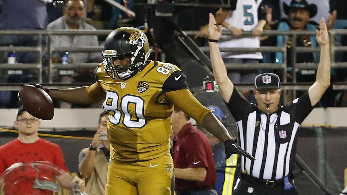 Jacksonville Jaguars tight end Julius Thomas (80) celebrates after scoring on a 5-yard touchdown against the Tennessee Titans in 2015. He might be part of a trade for Branden Albert.