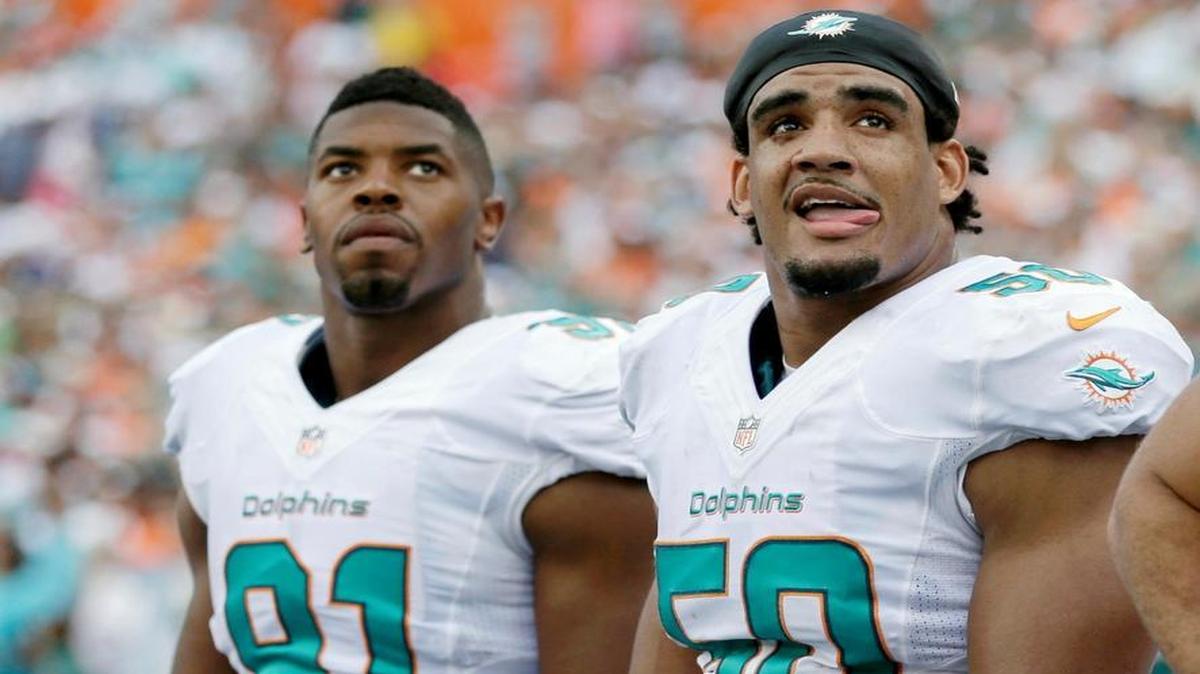 With the Miami Dolphins’ addition of free agent Mario Williams on Tuesday, March 8, 2016, it means either Cameron Wake, left, or Olivier Vernon (50) is likely headed elsewhere.