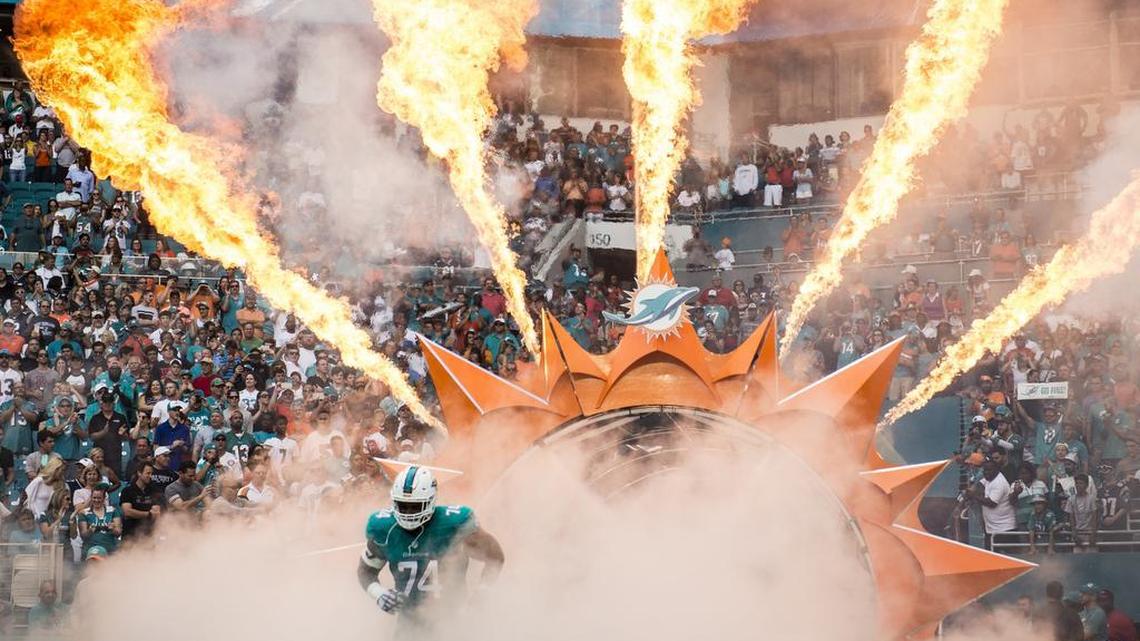 Miami Dolphins tackle Jermon Bushrod makes his entrance into the game versus the New England Patriots at Hard Rock Stadium last season.