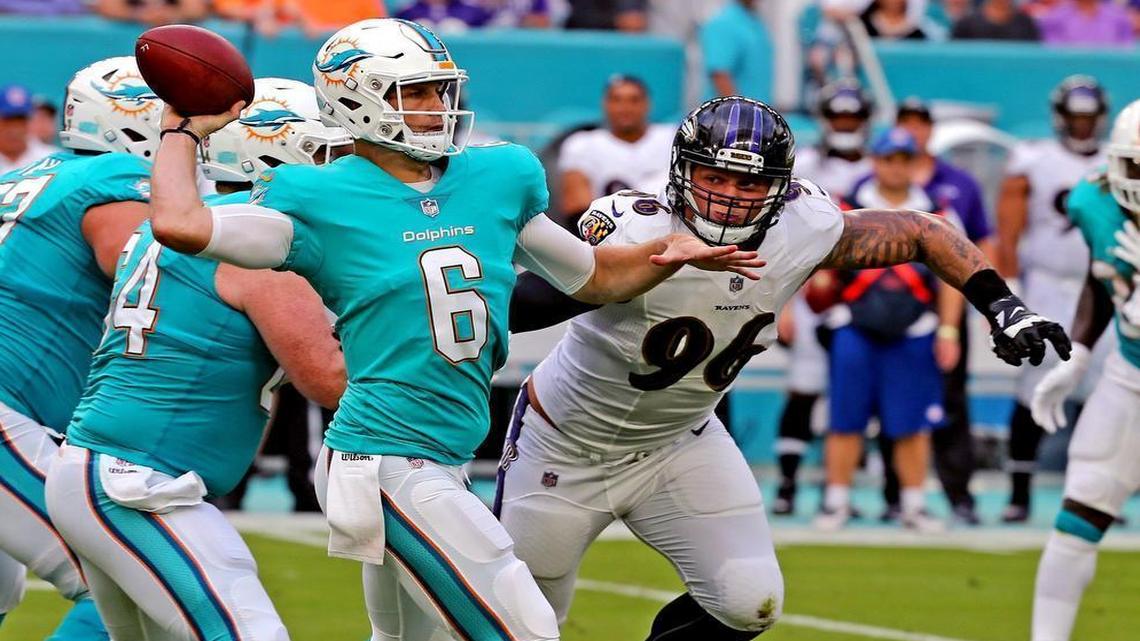 Dolphins quarterback Jay Cutler throws a pass in the first quarter of a preseason game against the Baltimore Ravens Thursday night.