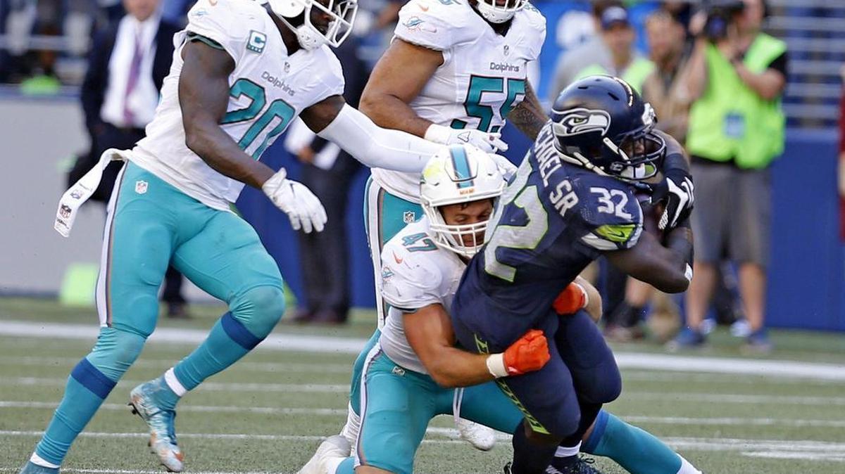 Kiko Alonso, here tackling Seattle Seahawks Christian Michael, started 15 regular-season games and in the playoffs at middle linebacker for the Miami Dolphins.