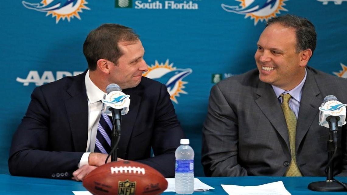 Miami Dolphins Mike Tannenbaum vice president of football operations with new head coach Adam Gase. Gase is the12th head coach in franchise history on Saturday, January 9, 2016 at the Miami Dolphins Training Facility in Davie.