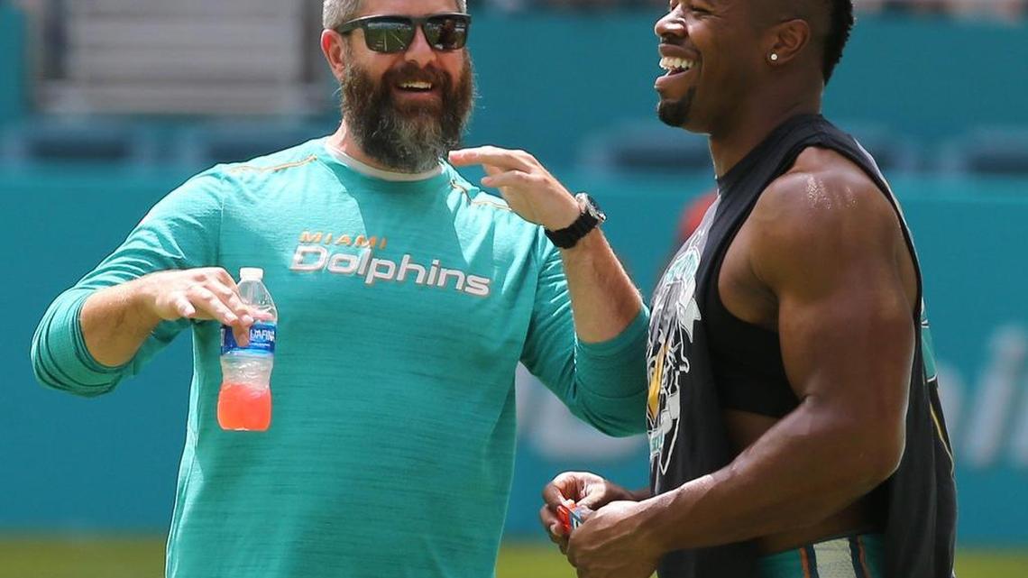 Miami Dolphins defensive coordinator Matt Burke and DE Cameron Wake before the Miami Dolphins scrimmage at Hard Rock Stadium on Aug. 5.
