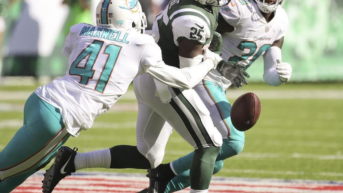 Miami Dolphins cornerback Byron Maxwell causes the Jets running back Elijah McGuire to fumble in the fourth quarter of a game two weeks ago.