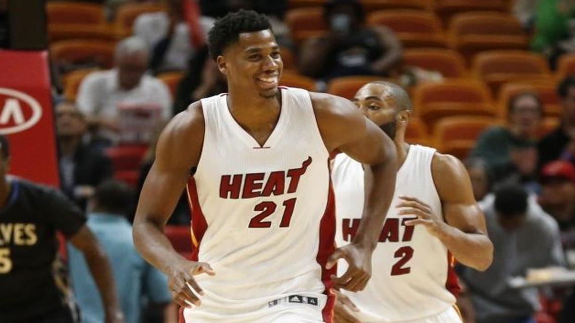 Miami Heat center Hassan Whiteside (21) is all smiles as the Heat score in the third quarter as the Miami Heat host the Minnesota Timberwolves at the American Airlines Arena on Friday, March 17, 2017.