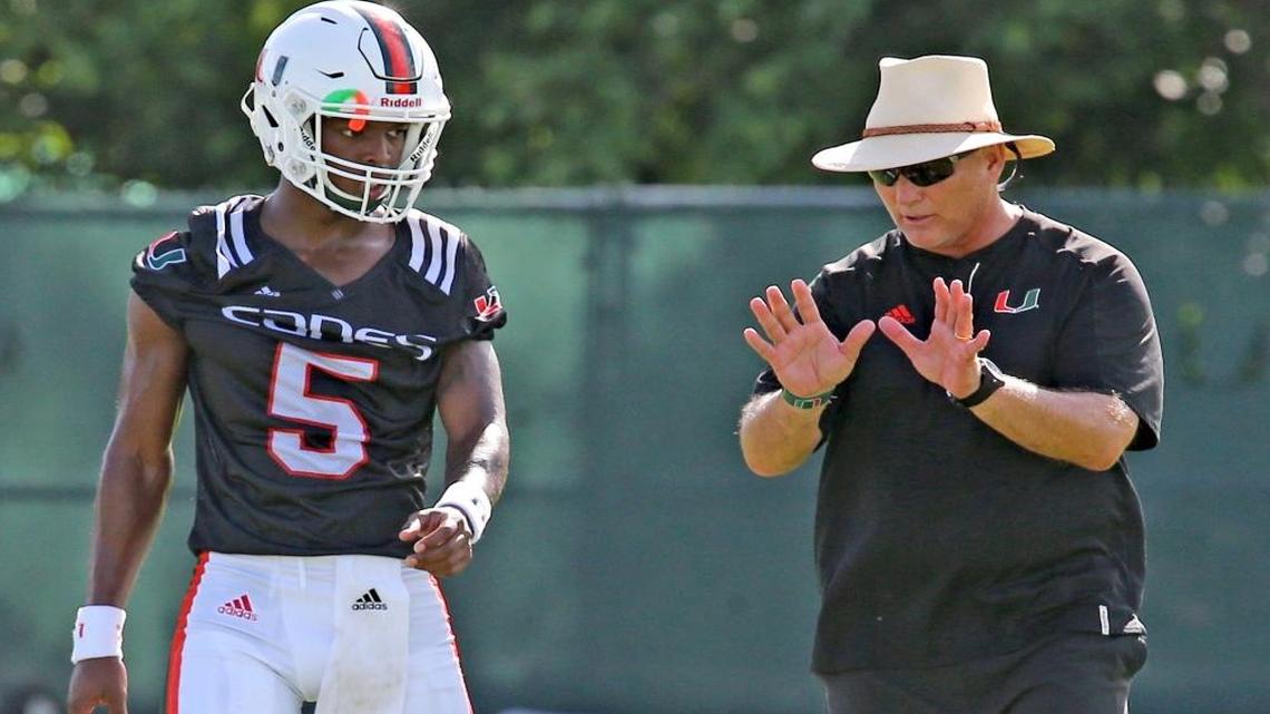 UM's head coach Mark Richt with quarterback N'Kosi Perry at the University of Miami's first day of football practice for the 2017 season, Miami, Florida, Aug. 1, 2017.