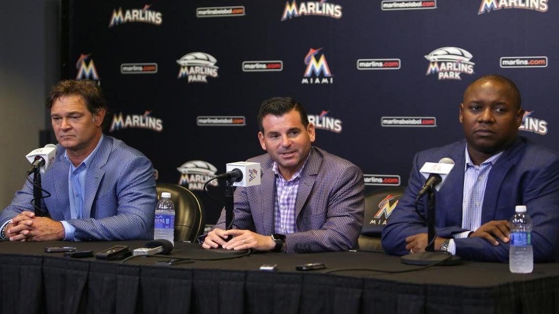 From left, Miami Marlins manager Don Mattingly, team president David Samson and team president of baseball operations Michael Hill talking during an end-of-year press conference at Marlins Park on Wed., Oct. 5, 2016.