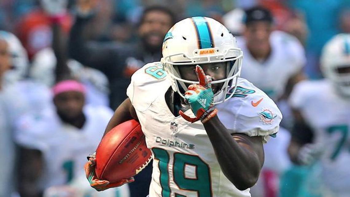 Miami Dolphins’ Jakeem Grant returns a kick for a second quarter touchdown against the Tennessee Titians at Hard Rock Stadium in Miami Gardens on October 9, 2016.