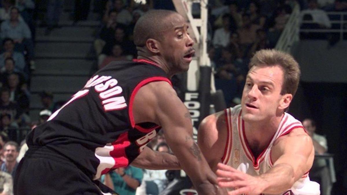From 1997: Miami Heat's John Crotty passes the ball past Portland's Kenny Anderson during first half action at the Arena. Crotty will take over as Heat TV analyst next season.