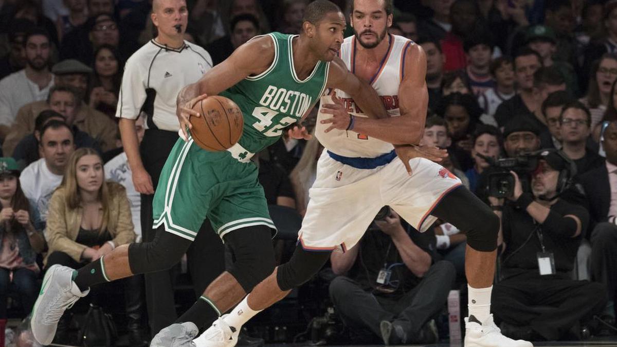 If the Boston Celtics and New York Knicks are going to contend in the Eastern Conference, they will need newcomers Al Horford, left and Joakim Noah to make big contributions.