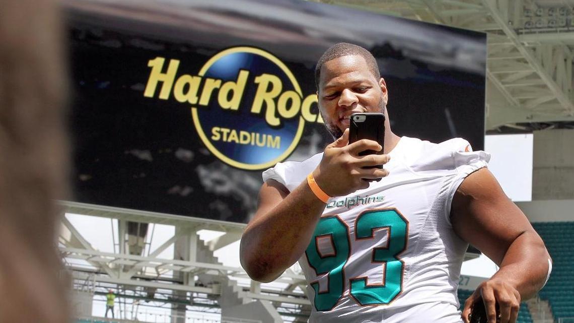 Dolphins defensive tackle Ndamukong Suh broadcasts live on social media during the announcement on Aug. 17, 2016, that the team’s home would be named Hard Rock Stadium. Suh was the only Dolphins player on ESPN’s top 100 ranking, but that doesn’t mean fans can’t be optimistic about the upcoming season.