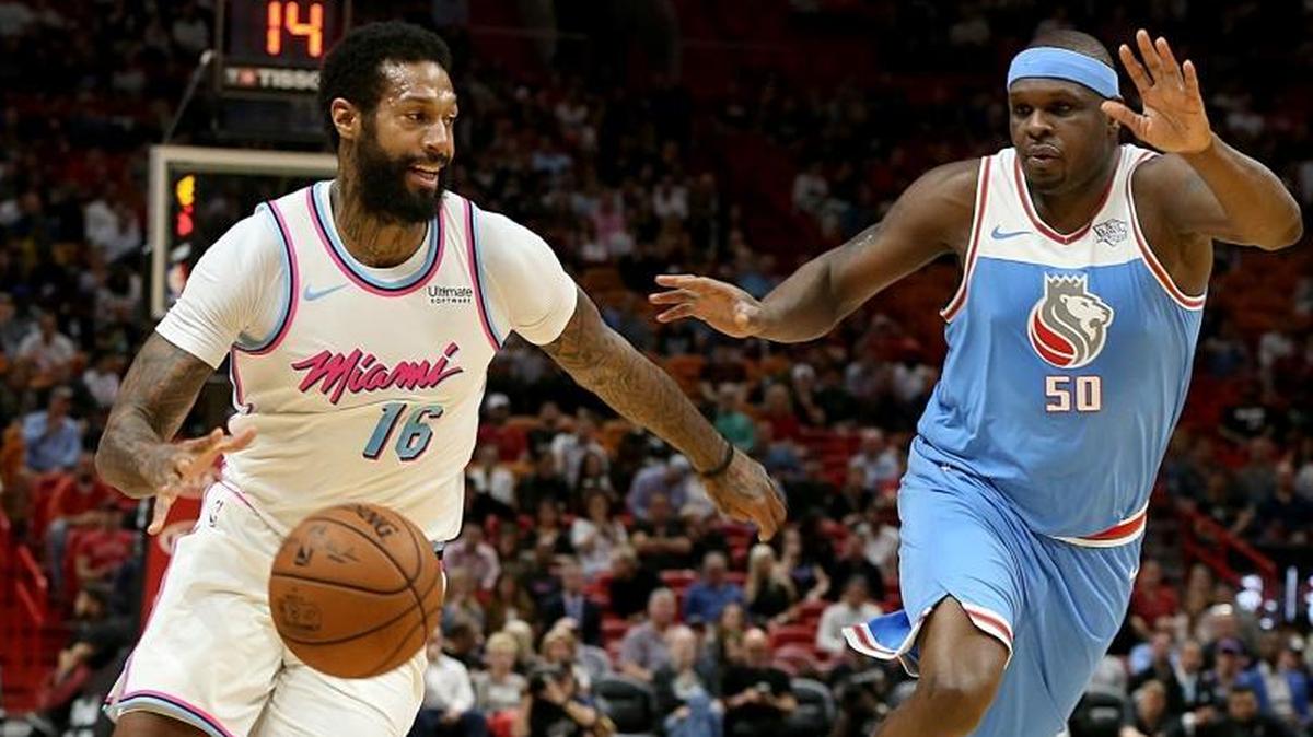 Heat forward James Johnson drives to the basket against Kings' forward Zach Randolph in the first quarter of the Miami Heat vs Sacramento Kings game at AmericanAirlines Arena in Miami on Thurs., Jan. 25, 2018.
