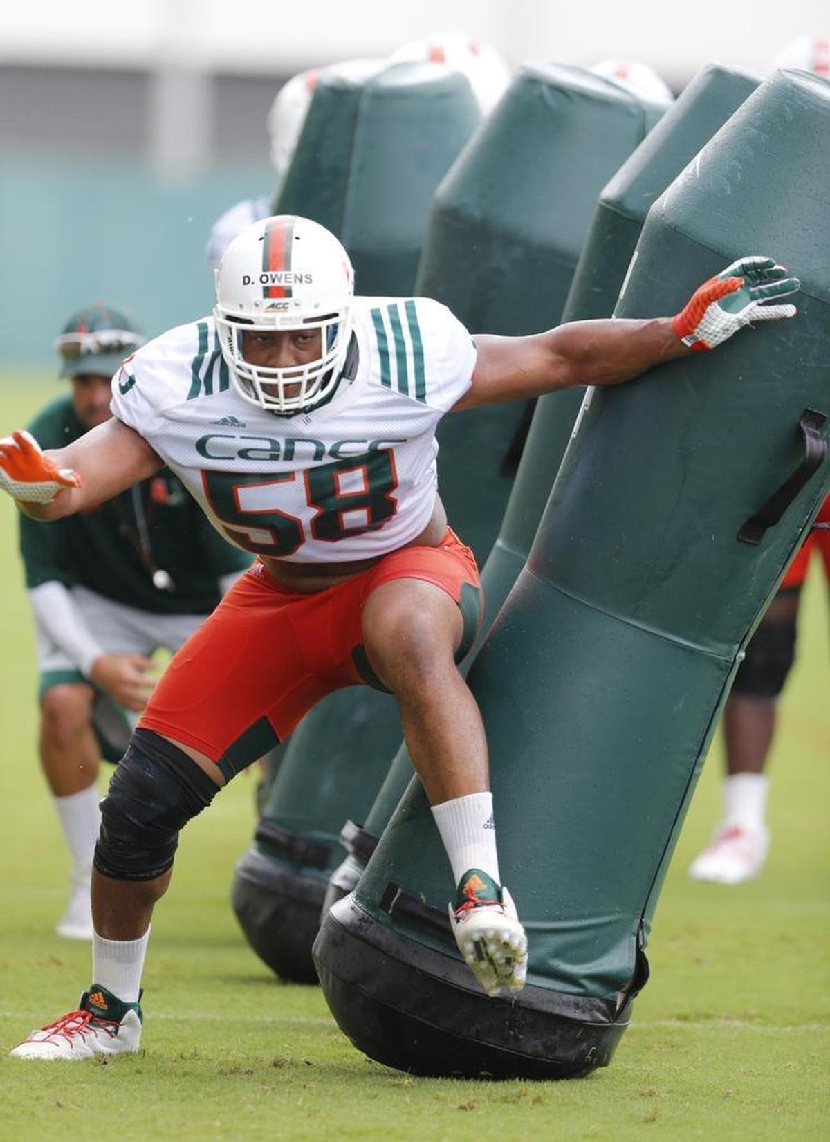 Miami Hurricanes linebacker Darrion Owens runs through drills on Saturday, Aug. 6, 2016. Owens, who returned from major knee surgery to be a contributing backup the past two years, is transferring, UM announced.